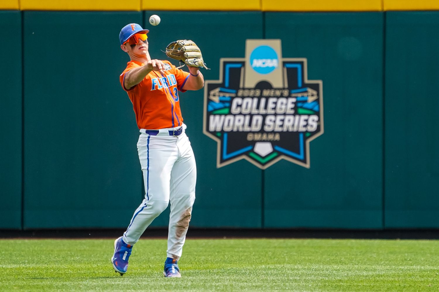 Jun 21, 2023; Omaha, NE, USA; Florida Gators center fielder Wyatt Langford (36) throws the ball after making a catch for an out against the TCU Horned Frogs during the sixth inning at Charles Schwab Field Omaha. Mandatory Credit: Dylan Widger-USA TODAY Sports